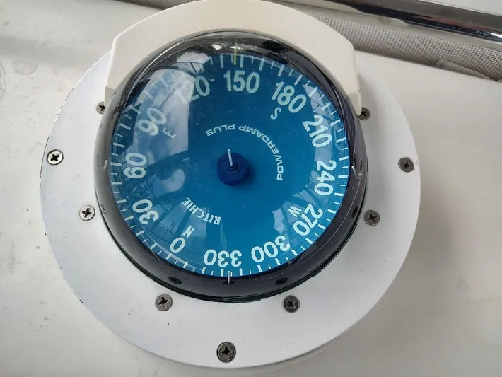 Seeker Yacht Photos Pics Close-up of a blue marine compass on a Stevens Custom 53/56 boat, 2005 model.