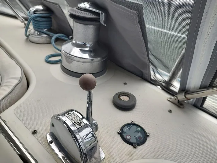 Seeker Yacht Photos Pics Boat cockpit controls on a 2005 Stevens Custom 53/56, featuring winch and throttle lever.