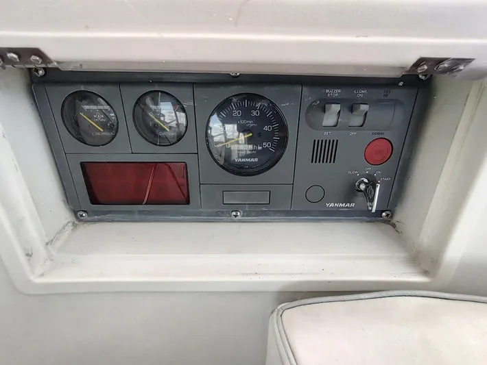 Seeker Yacht Photos Pics Control panel of a 2005 Stevens Custom 53/56 boat with Yanmar engine gauges.