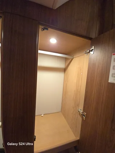 Ocean Driver Yacht Photos Pics Interior wooden cabinet in 2022 Riviera 54 Enclosed Flybridge yacht.