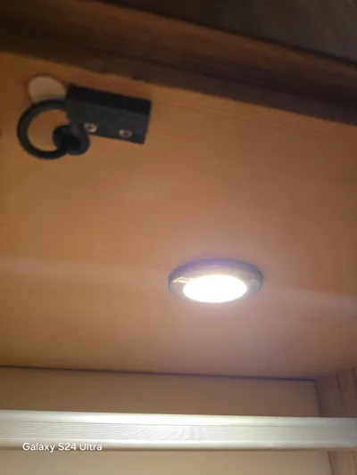 Ocean Driver Yacht Photos Pics LED light fixture in 2022 Riviera 54 Enclosed Flybridge interior.