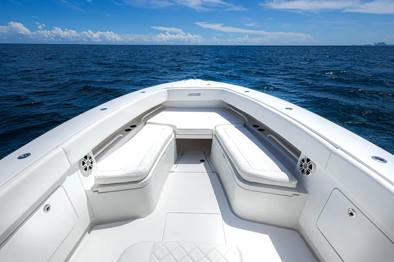 Bandit Yacht Photos Pics 2018 Jupiter 38 FS boat interior with white seating, on open ocean under blue sky.