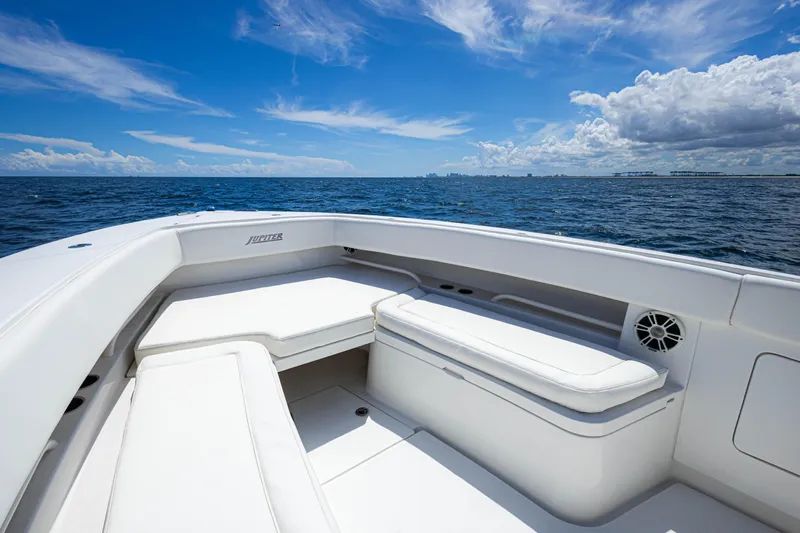 Bandit Yacht Photos Pics 2018 Jupiter 38 FS boat interior with white seating, ocean view, and blue sky.