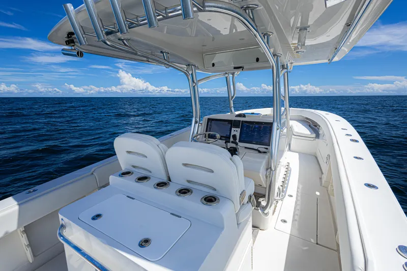 Bandit Yacht Photos Pics 2018 Jupiter 38 FS boat on open sea, featuring sleek design and modern navigation equipment.