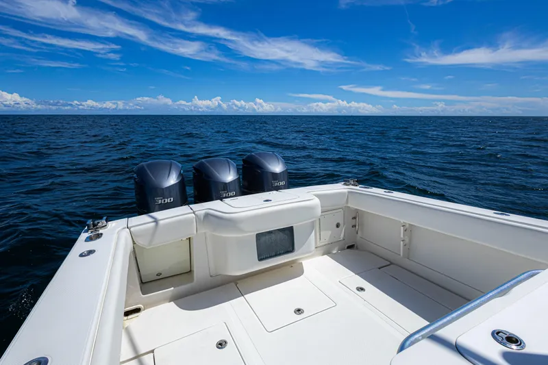 Bandit Yacht Photos Pics 2018 Jupiter 38 FS boat with triple 300 horsepower engines on open sea.