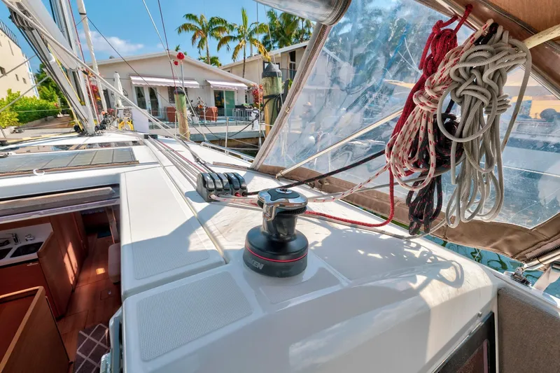 Dantari Yacht Photos Pics Jeanneau Sun Odyssey 440 sailboat deck with ropes and winch, 2021 model.