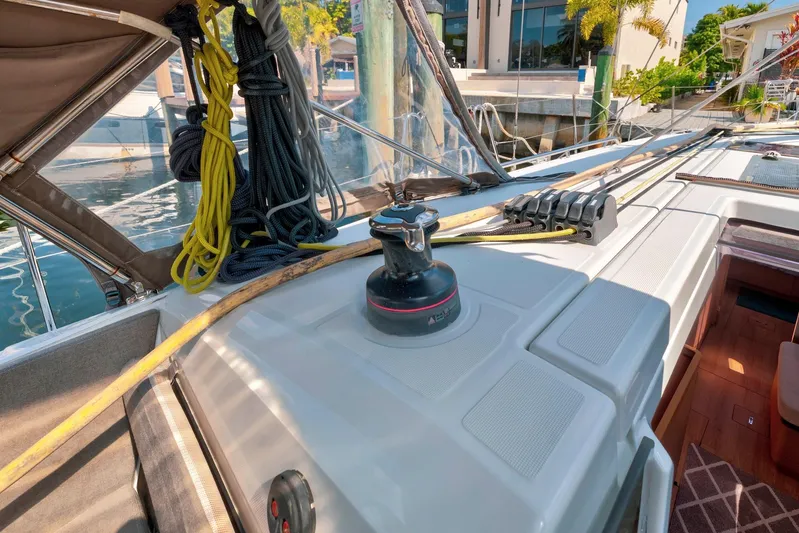 Dantari Yacht Photos Pics Jeanneau Sun Odyssey 440 sailboat deck with ropes and winch, 2021 model.