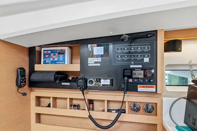 Dantari Yacht Photos Pics Control panel of 2021 Jeanneau Sun Odyssey 440 yacht, featuring navigation and communication equipment.