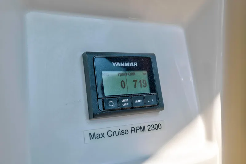 Dantari Yacht Photos Pics Yanmar engine display on 2021 Jeanneau Sun Odyssey 440, showing 719 hours, max cruise RPM 2300.