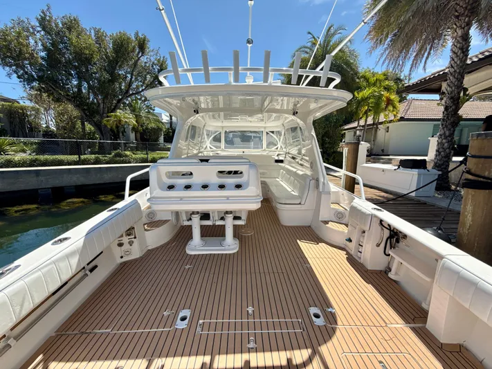  Yacht Photos Pics 2013 Intrepid 390 Sport Yacht with spacious deck and modern design.