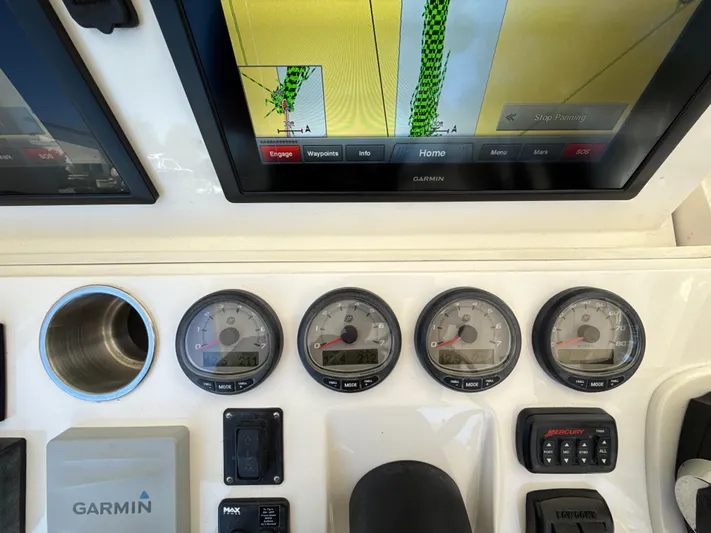  Yacht Photos Pics Control panel of a 2013 Intrepid 390 Sport Yacht with Garmin navigation system.