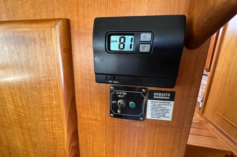 S.k.i Yacht Photos Pics Thermostat and control panel on 2000 Eagle 40 Pilothouse Trawler interior.
