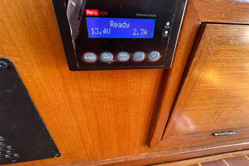 S.k.i Yacht Photos Pics Control panel on 2000 Eagle 40 Pilothouse Trawler displaying voltage and current.