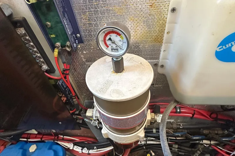 S.k.i Yacht Photos Pics Engine room of 2000 Eagle 40 Pilothouse Trawler with fuel filter and gauge.