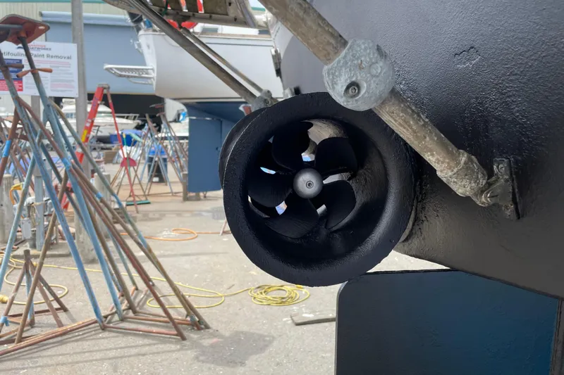 S.k.i Yacht Photos Pics Bow thruster of 2000 Eagle 40 Pilothouse Trawler in a boatyard setting.