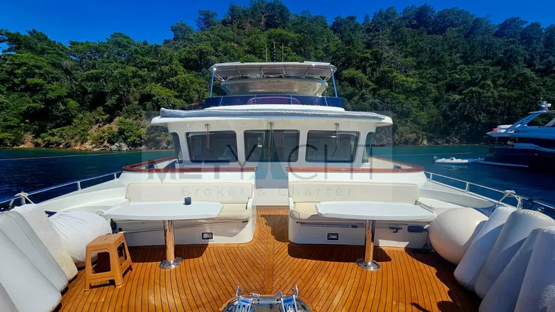  Yacht Photos Pics Luxurious 2010 Ses Yachts 100 with spacious deck and scenic backdrop.