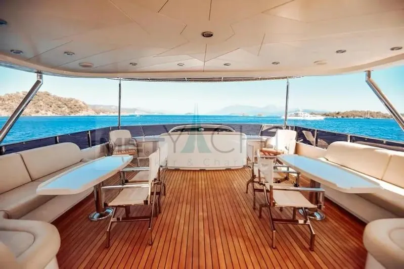  Yacht Photos Pics Luxurious 2010 Ses Yachts 100 deck with elegant seating and ocean view.