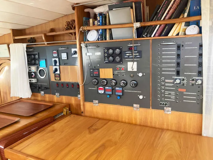Conan Yacht Photos Pics Control panel and navigation area inside a 1988 Joubert Custom Trimaran sailboat.