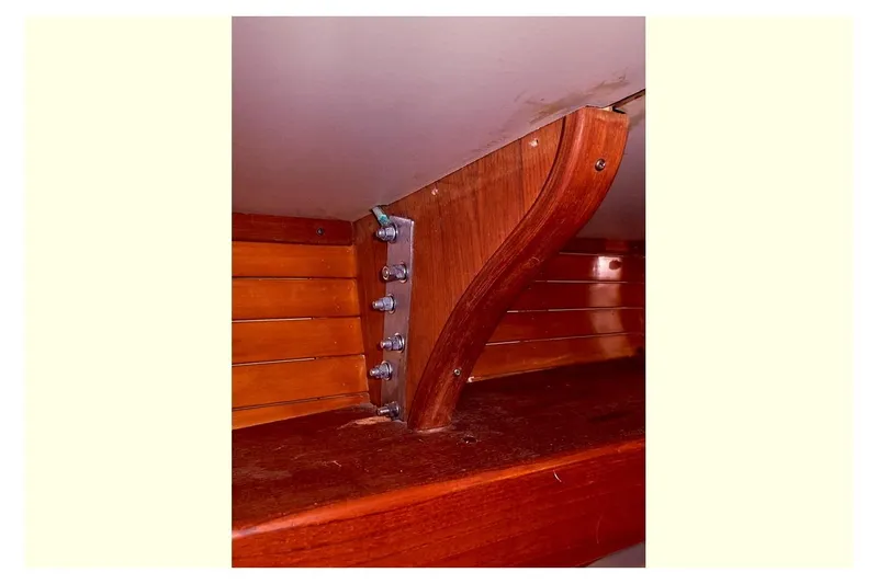  Yacht Photos Pics 1983 Valiant 40 Selah interior woodwork detail with metal bolts.