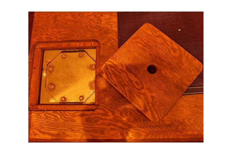  Yacht Photos Pics Wooden hatch cover and metal plate on 1983 Valiant 40 Selah boat.