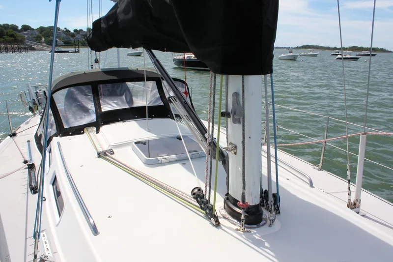 Lola Yacht Photos Pics Sailboat deck view of 1995 J Boats J/130, moored in a scenic harbor.