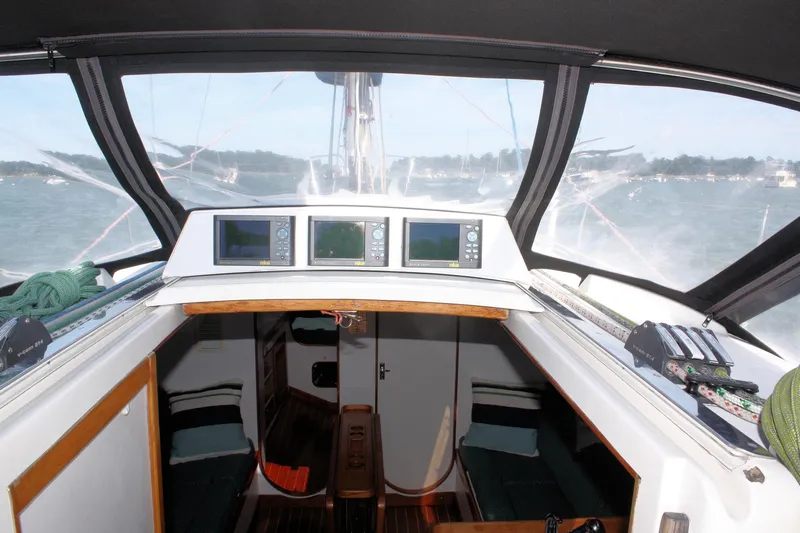 Lola Yacht Photos Pics Interior view of 1995 J Boats J/130 sailboat cockpit with navigation instruments.