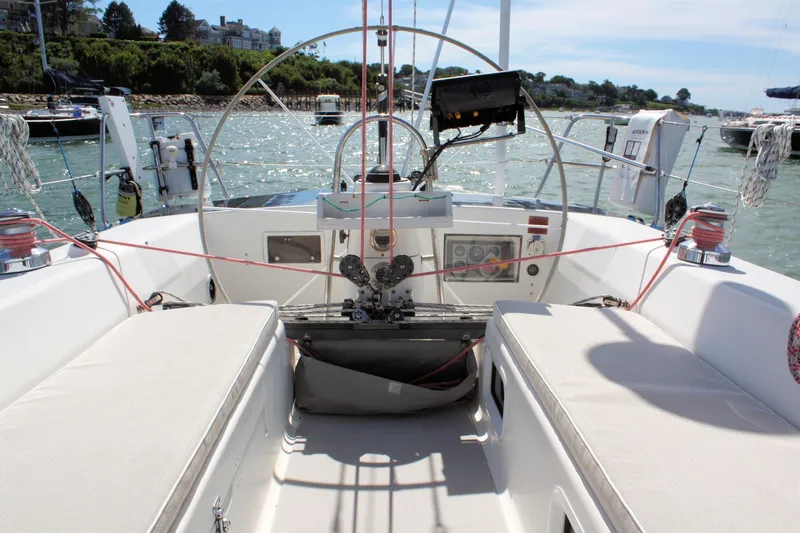 Lola Yacht Photos Pics Cockpit of a 1995 J Boats J/130 sailboat with scenic harbor view.