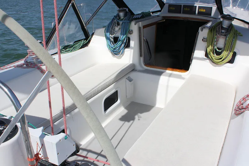 Lola Yacht Photos Pics Cockpit of 1995 J Boats J/130 sailboat with seating and ropes.