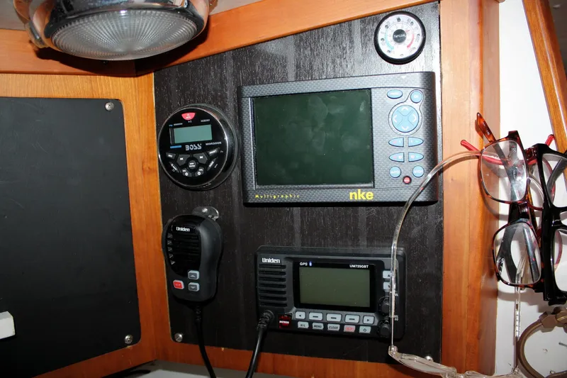 Lola Yacht Photos Pics Navigation equipment and radios on a 1995 J Boats J/130 sailboat dashboard.