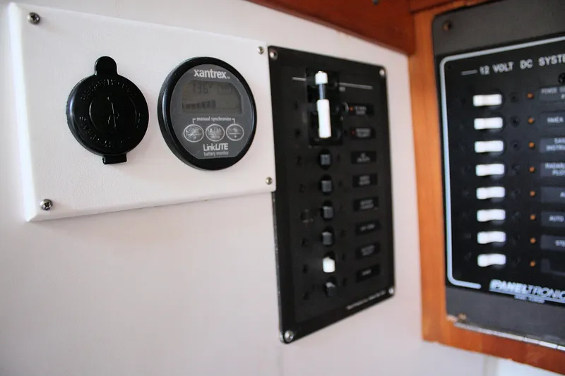 Lola Yacht Photos Pics Electrical panel and battery monitor on a 1995 J Boats J/130 sailboat.