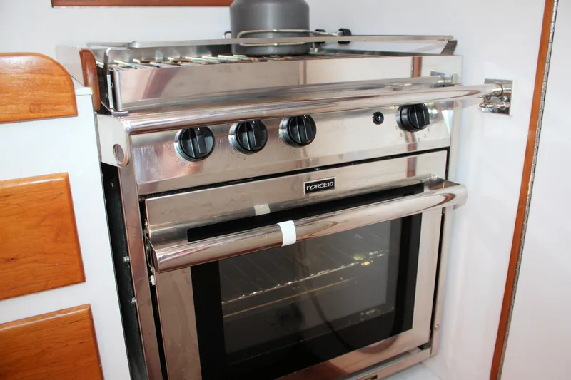 Lola Yacht Photos Pics Stainless steel oven in 1995 J Boats J/130 yacht galley.