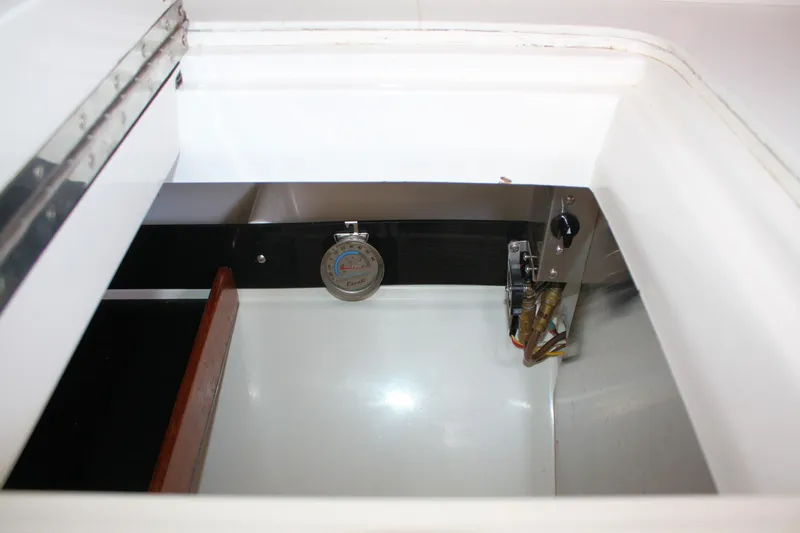 Lola Yacht Photos Pics Interior view of 1995 J Boats J/130 sailboat compartment with gauge and wiring.