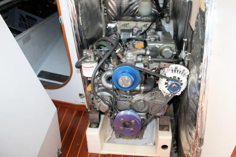 Lola Yacht Photos Pics Engine compartment of a 1995 J Boats J/130 sailboat, featuring a Yanmar engine.