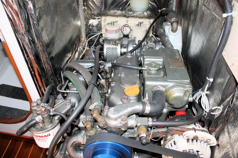 Lola Yacht Photos Pics Engine compartment of a 1995 J Boats J/130 sailboat, featuring a Yanmar engine.