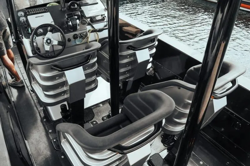  Yacht Photos Pics Interior of 2008 Fabio Buzzi FB 38 boat with modern seating and control panel.