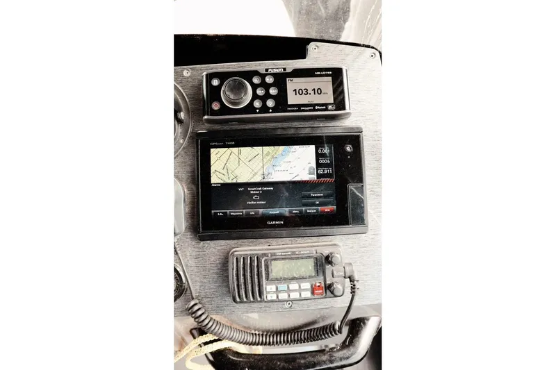  Yacht Photos Pics Dashboard of a 2008 Fabio Buzzi FB 38 with navigation and communication equipment.