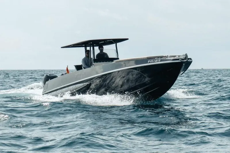  Yacht Photos Pics 2008 Fabio Buzzi FB 38 speedboat cruising on open water.