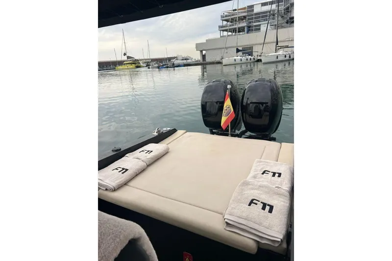  Yacht Photos Pics Luxury Fabio Buzzi FB 38 boat with twin engines, Spanish flag, and branded towels in a marina.