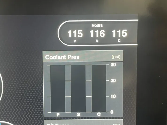 Sea Hawk Yacht Photos Pics Display panel of 2020 Pursuit OS 355 Offshore showing engine hours and coolant pressure.
