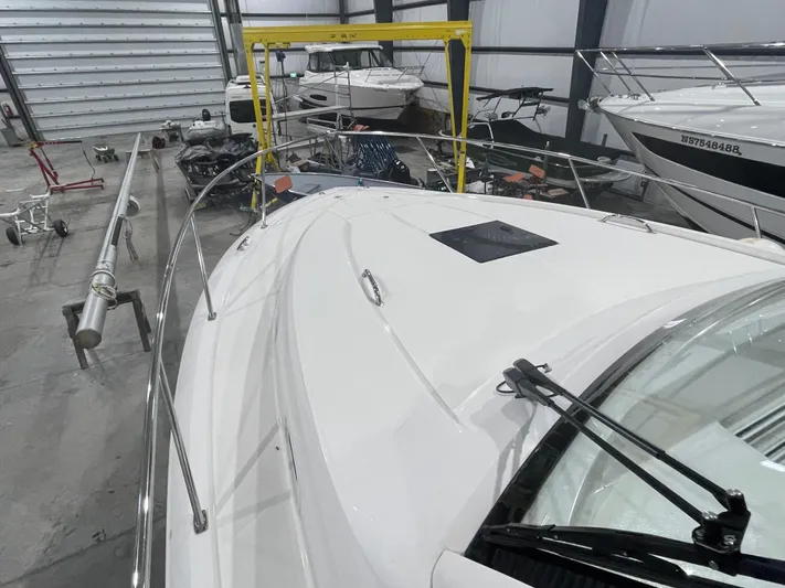 Sea Hawk Yacht Photos Pics 2020 Pursuit OS 355 Offshore boat in indoor storage facility.