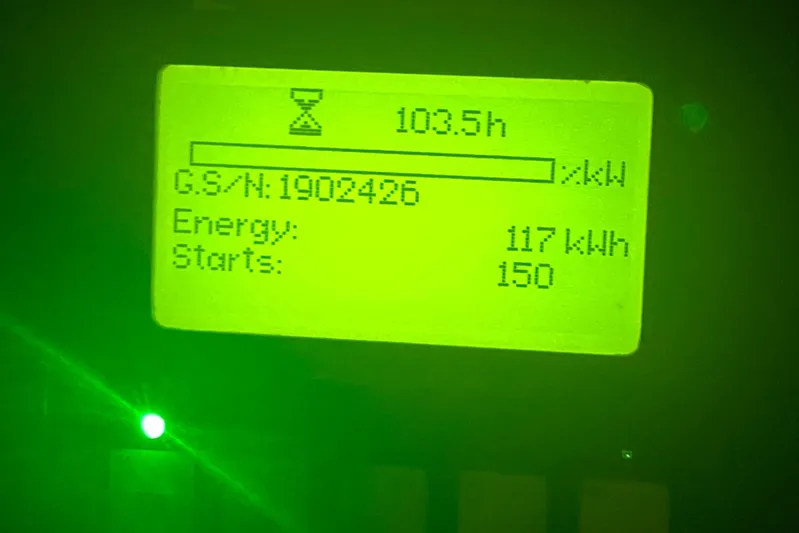 Sea Hawk Yacht Photos Pics Display screen showing 103.5 hours, 117 kWh energy, 150 starts on Pursuit OS 355 Offshore.