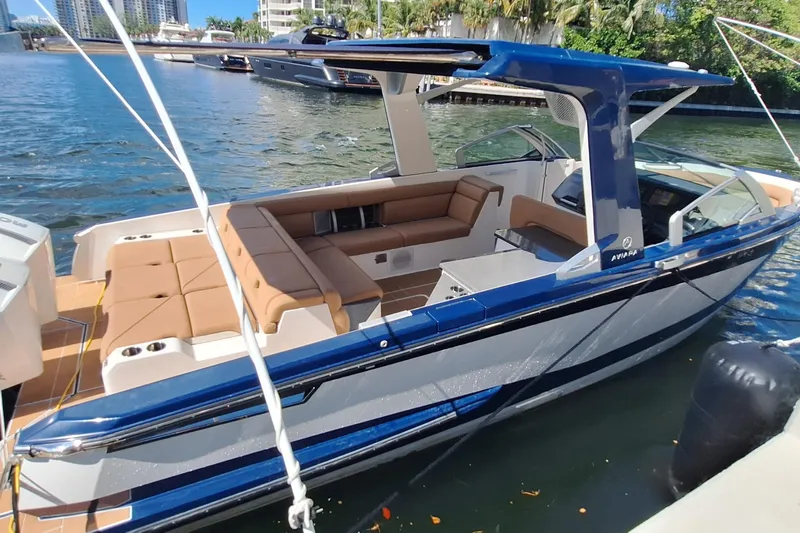  Yacht Photos Pics 2021 Aviara AV32 OB luxury boat docked, featuring sleek design and spacious seating.