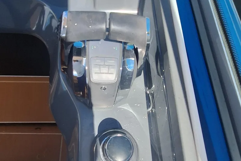  Yacht Photos Pics Throttle controls of 2021 Aviara AV32 OB boat, featuring sleek design and modern technology.