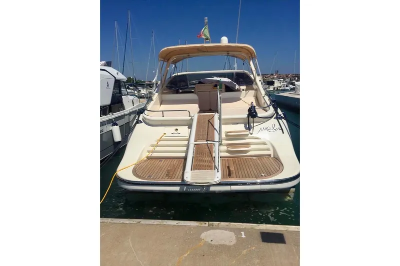  Yacht Photos Pics 2008 Cantieri di Sarnico 43 yacht docked at marina, rear view.