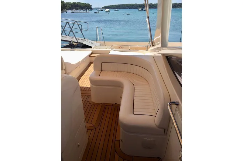  Yacht Photos Pics Luxurious 2008 Cantieri di Sarnico 43 yacht interior with elegant seating and scenic ocean view.