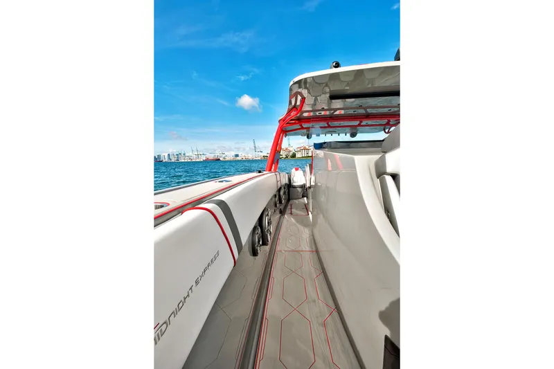  Yacht Photos Pics 2023 Midnight Express 43 Open boat on water, showcasing sleek design and vibrant accents.
