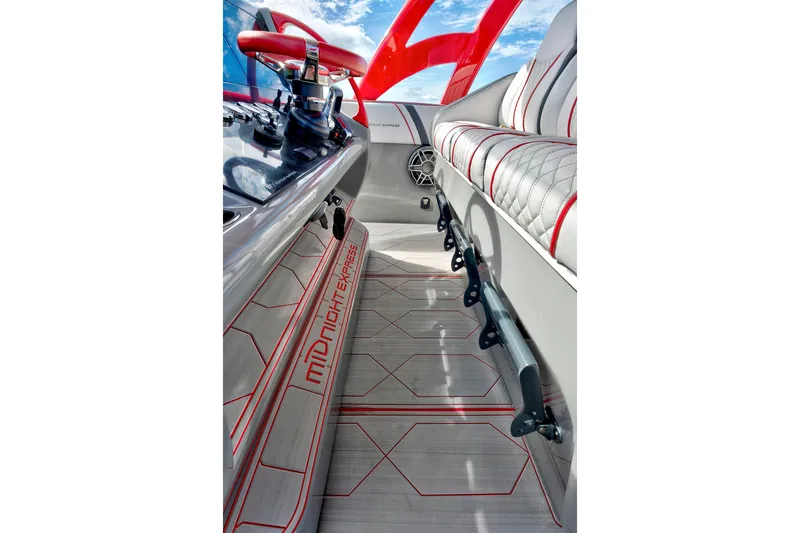  Yacht Photos Pics Interior of 2023 Midnight Express 43 Open boat with sleek design and red accents.