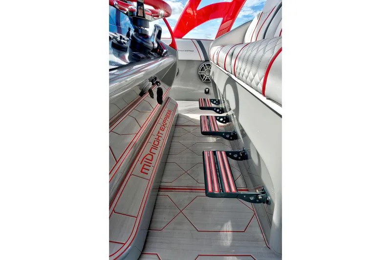  Yacht Photos Pics Interior of 2023 Midnight Express 43 Open boat with sleek design and red accents.