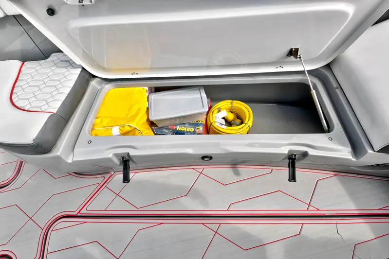  Yacht Photos Pics Open storage compartment on 2023 Midnight Express 43 Open boat, containing yellow rope and supplies.