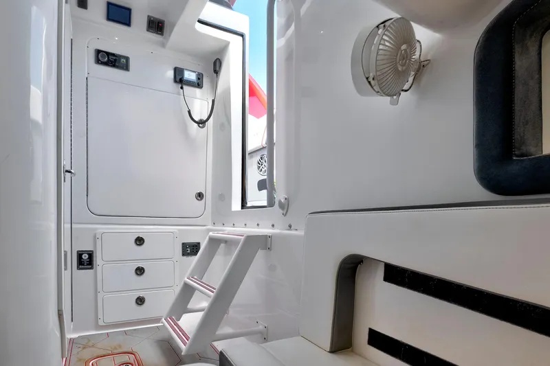  Yacht Photos Pics Interior of 2023 Midnight Express 43 Open boat, featuring sleek white design and modern amenities.